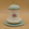 This shows the backside of the cup with the handle on the left.